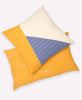hand-embroidered modern throw pillows in mustard yellow and slate blue patchwork