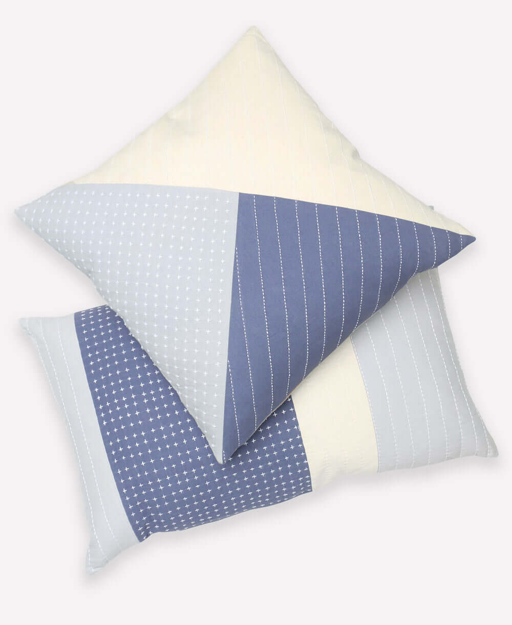 pair of blue modern colorblock patchwork pillows handmade by women artisans from organic cotton