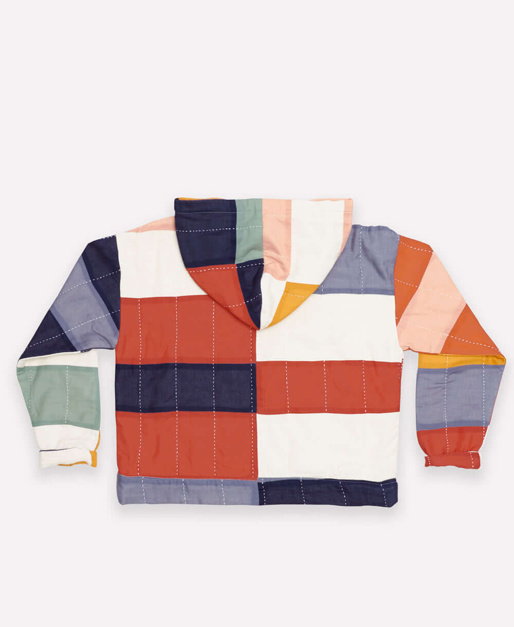 colorblock quilted hoodie with multi-color colorblocks and hand-stitched embroidery