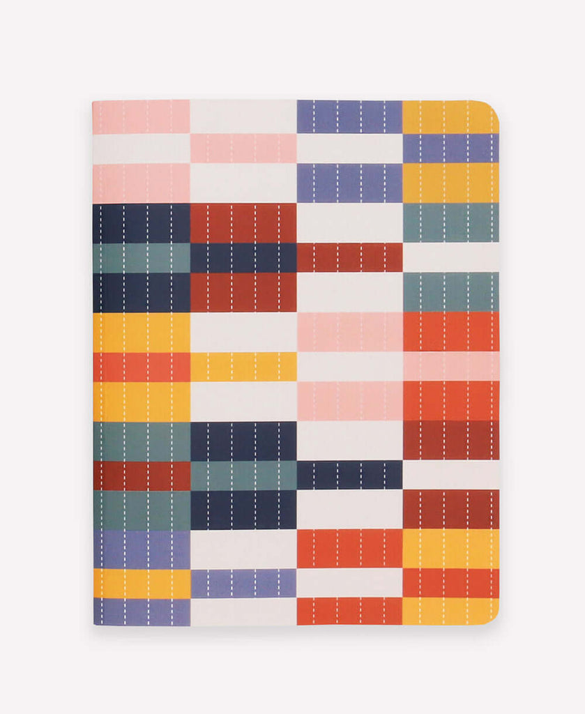 medium colorful softcover notebook lined with dotted paper