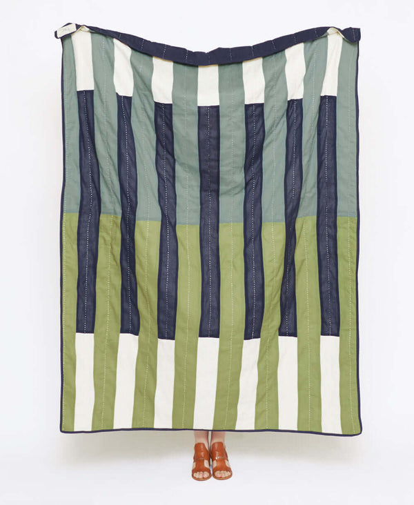 modern kantha quilt with colorblock stripe design in cool blues and greens made from organic cotton by Anchal Project
