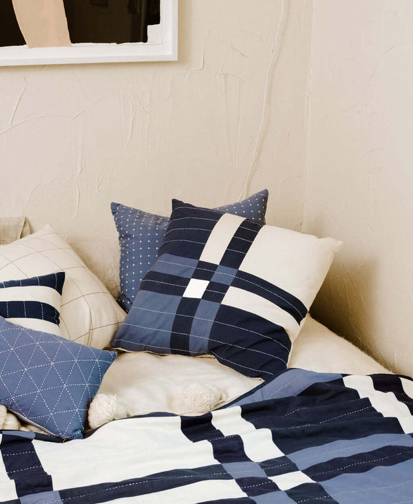 handmade throw pillows with navy and slate blue colorways