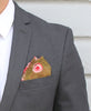 Traditionally patterned pocket square with a mix of paisley patterns paired with a men's jalcket