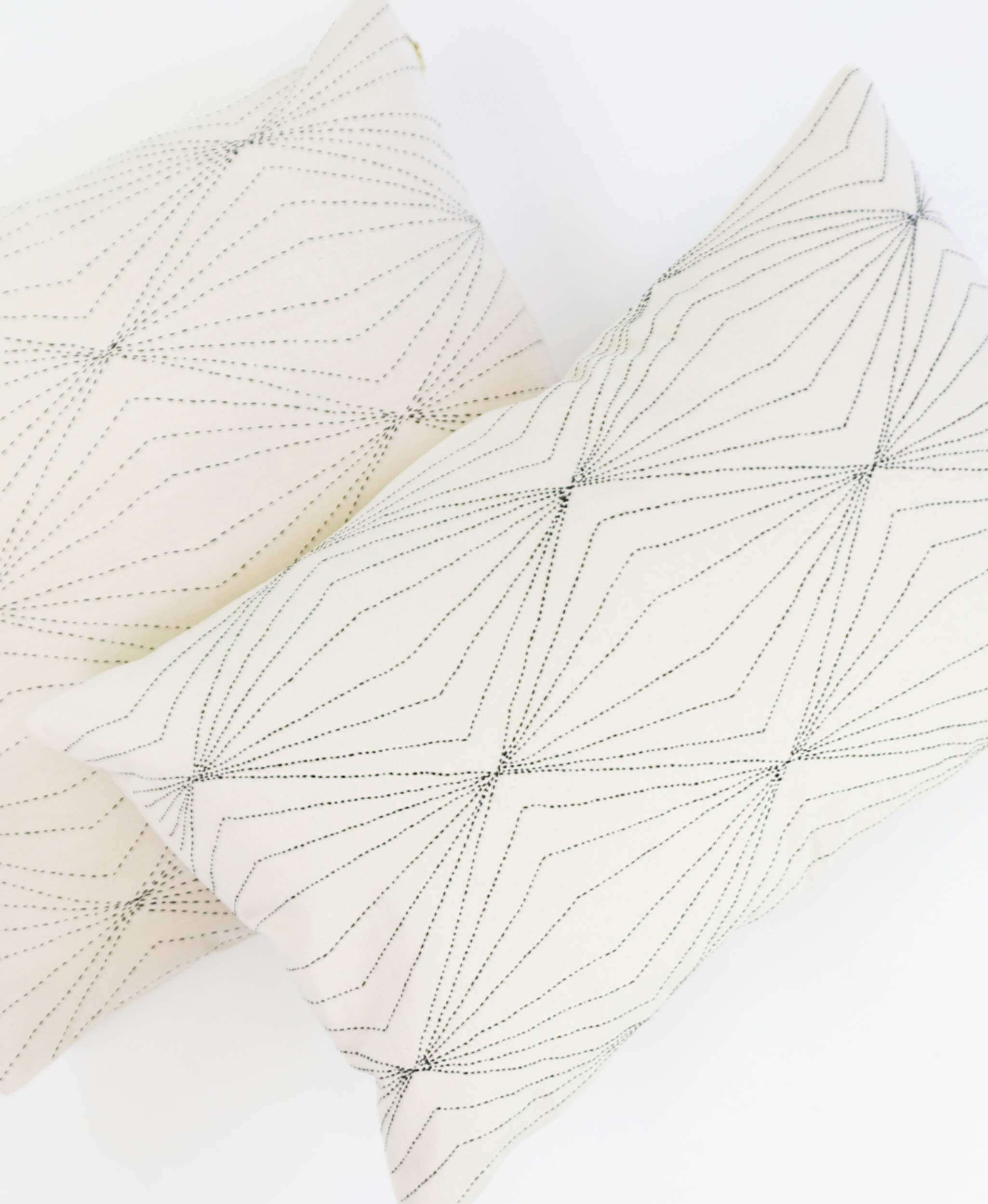 coordinating prism throw pillows featuring kantha stitching by Anchal Project