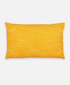 mustard lumbar throw pillow made with organic cotton and fair trade certified