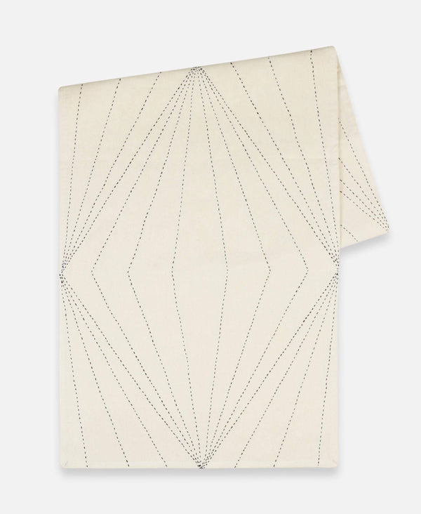 Anchal Project organic cotton table runner with hand-stitched prism design in ivory
