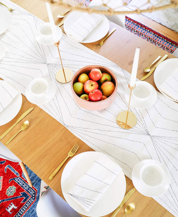 mid-century modern tablescape featuring Anchal organic cotton embroidered table runner in ivory