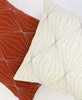 white and rust organic cotton throw pillows ethically made by Anchal artisans