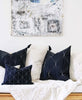 contemporary monochromatic pillow arrangement in modern home