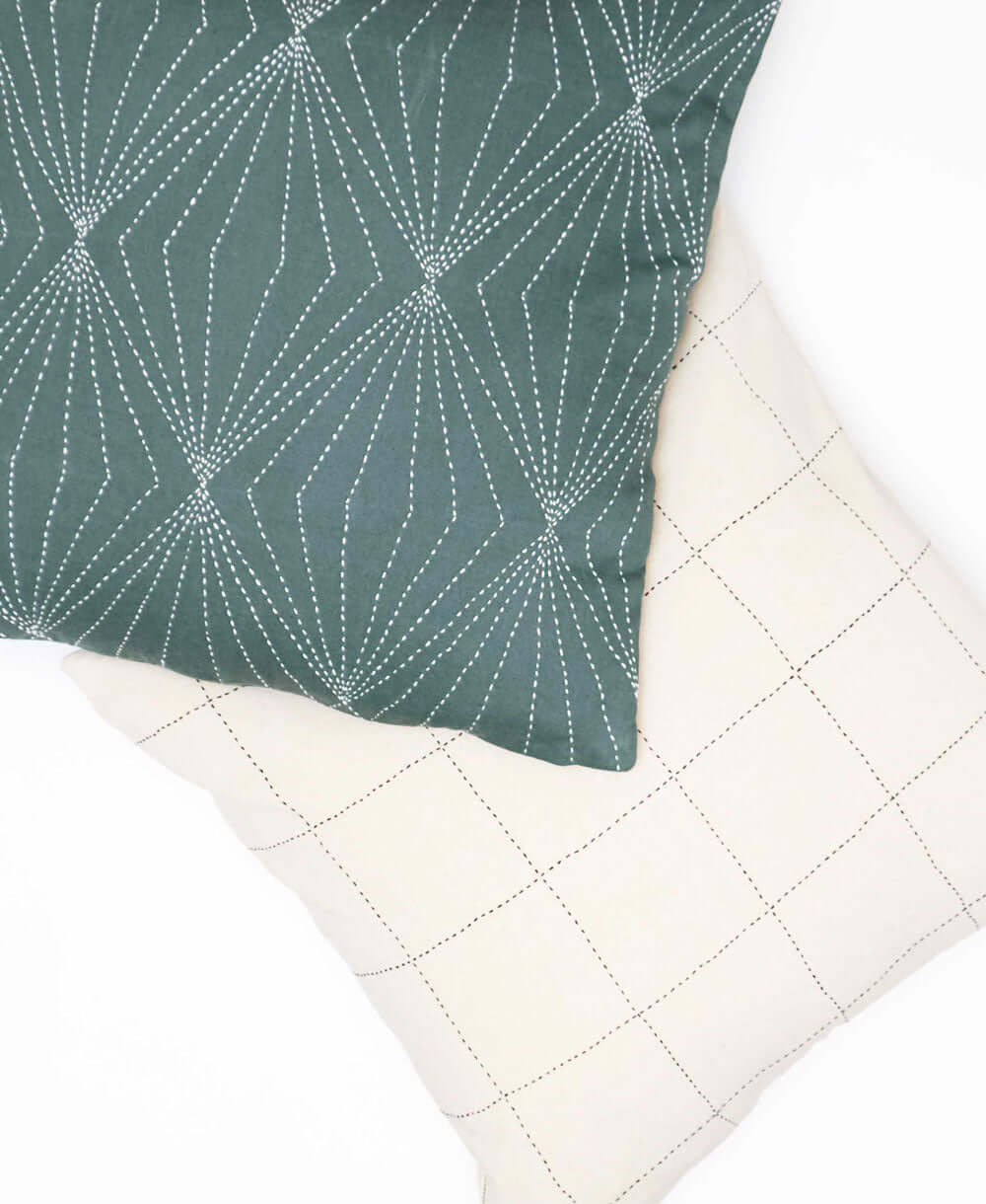 pair of fair trade throw pillows with geometric grid design by Anchal