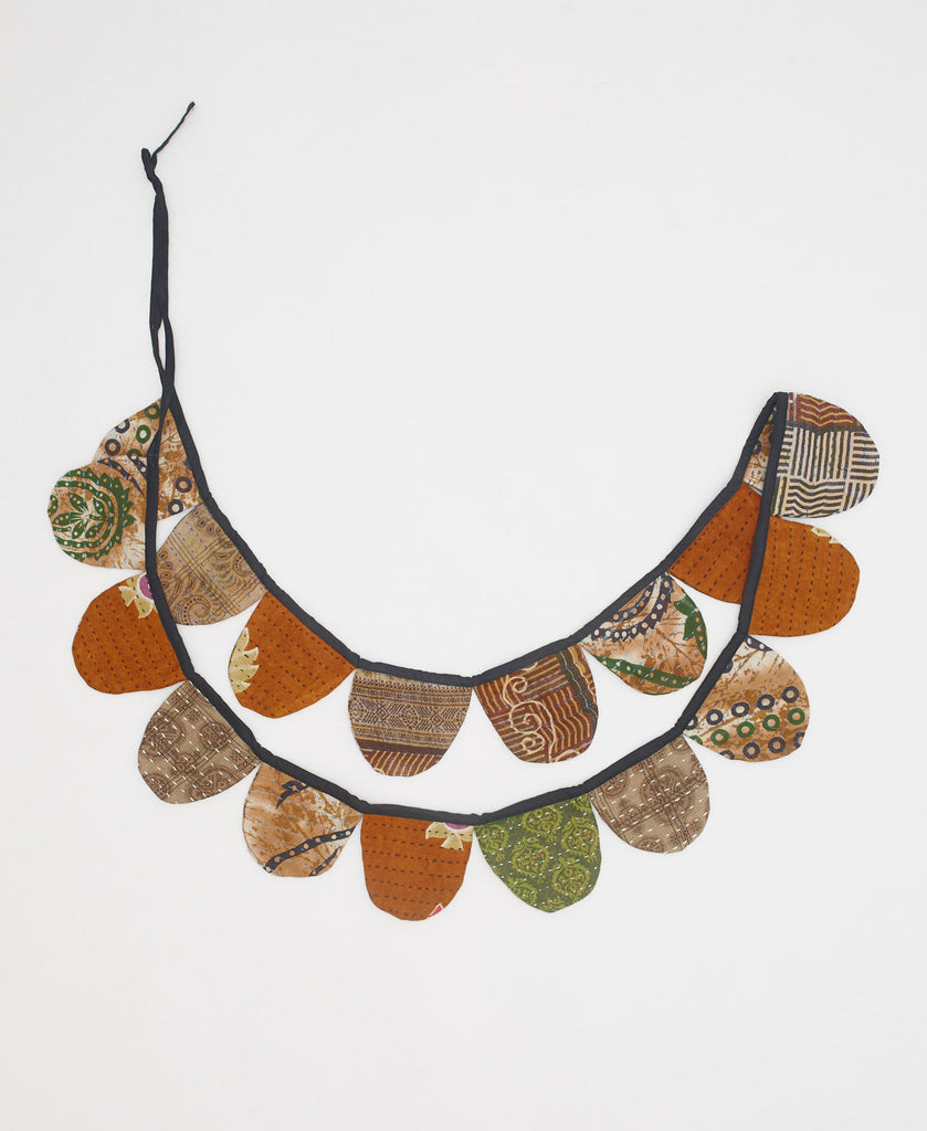orange and brown upcycled party decoration to hang on walls, windows, mantles, or in doorways 