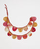 festive red, orange, and white scallop holiday garland