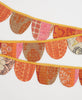 In hues of pink and orange, this cotton garland this the perfect ecofriendly decoration 