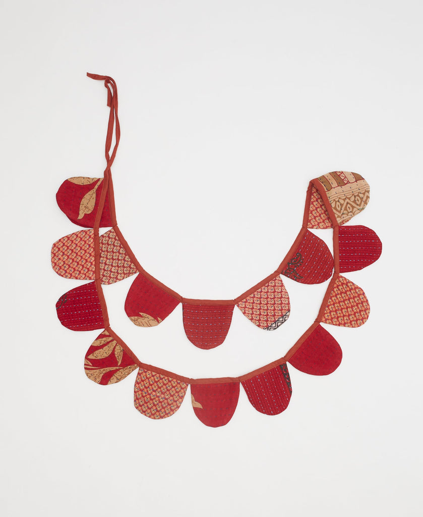 red scallop holiday garland with beige details