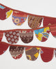 eco-friendly party bunting handmade by women artisans using scraps of recycled vintage cotton saris