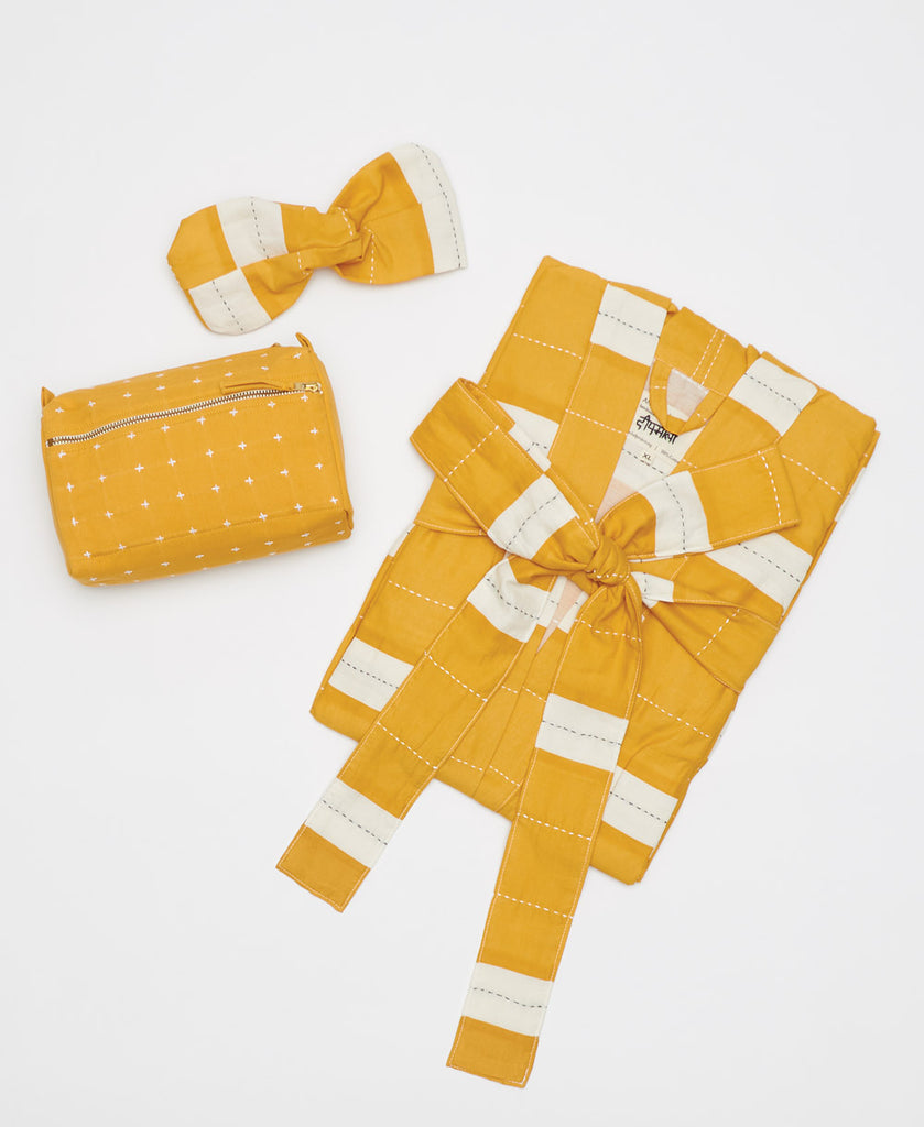 striped yellow robe and matching headband with coordinating toiletry bag by Anchal