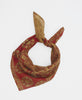 traditional red and gold bandana with paisley and floral patterns