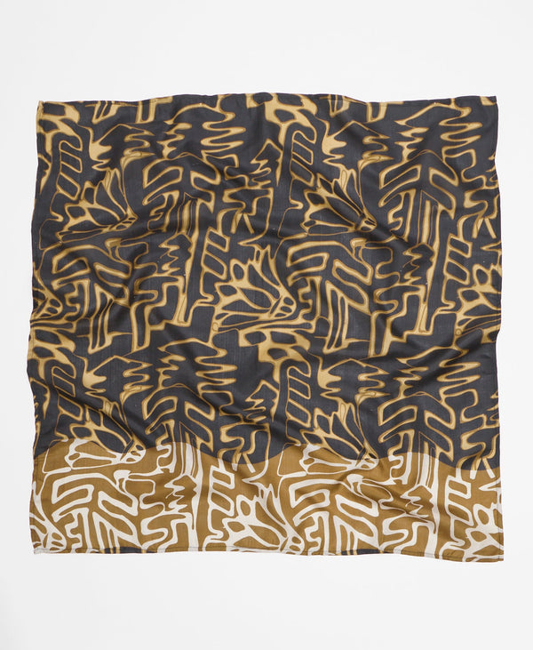 Arstian-made silk square scarf featuring a black background and  a forest green and white bold geometric print 