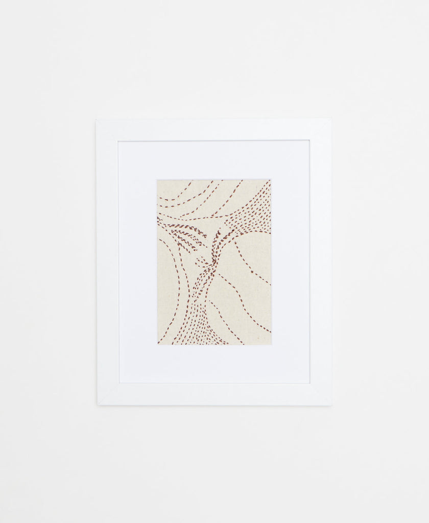Artisan made artwork featuring a burgundy hand-stitched fruit pattern on a white background 
