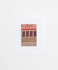 Artisan made hand stitched framed art featuring a red, beige and black color palette 