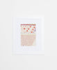 Handcrafted Artisan framed textile artwork featuring a red floral pattern on a white background.
