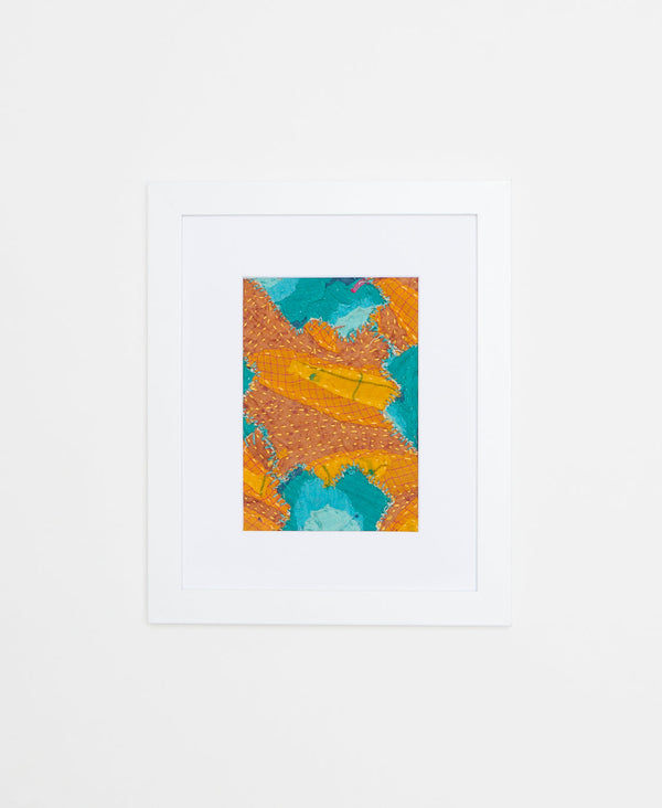 Handcrafted Artisan textile framed artwork featuring a vibrant blue and orange abstract pattern  