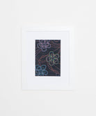 Handcrafted artisan-made textile framed artwork featuring a floral design on a navy blue or black background 