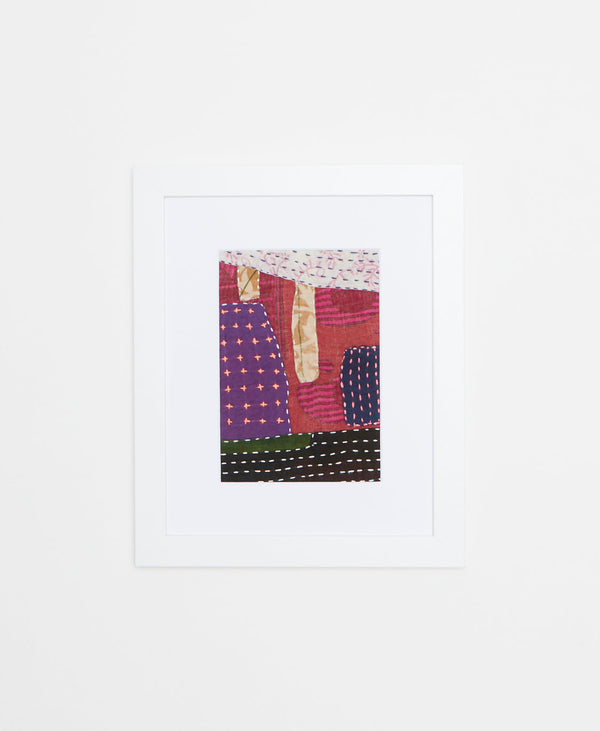 Handcrafted artisan-made textile framed art featuring an abstract print in jewel tones 