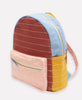 handmade colorblock backpack purse in rust, mustard yellow, salmon pink, and sky blue