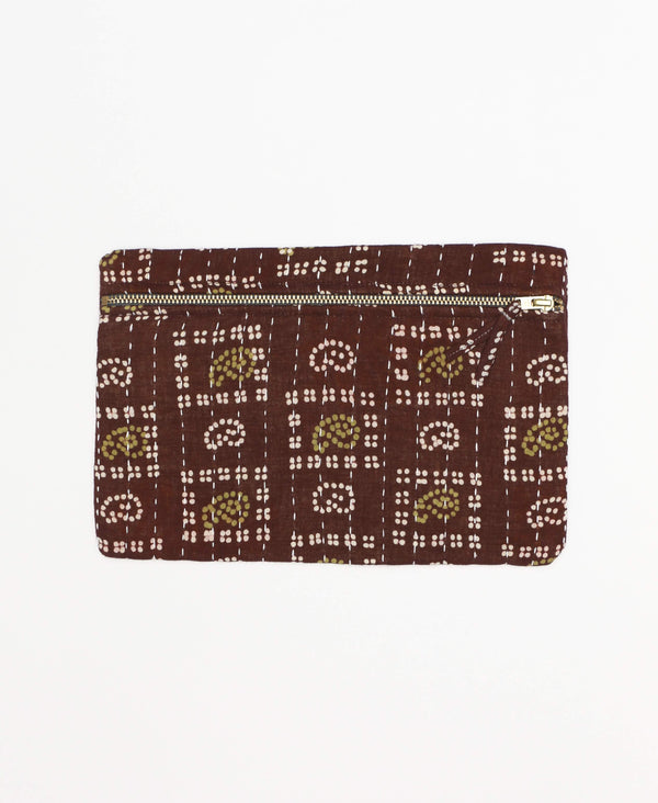 maroon, green, and cream colored small pouch that has geometric designs 
