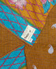 brown and blue kantha lap quilt handmade by women artisans in Ajmer, India