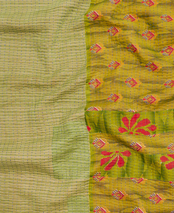 green kantha quilt sustainably made using vintage saris 