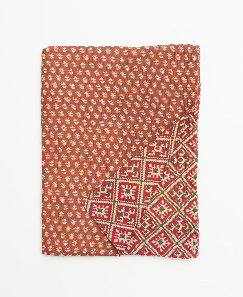 ikat print red and tan kantha quilt throw with reversible sides