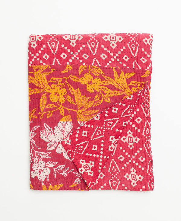 red and gold handmade kantha quilt made in India by Anchal artisans