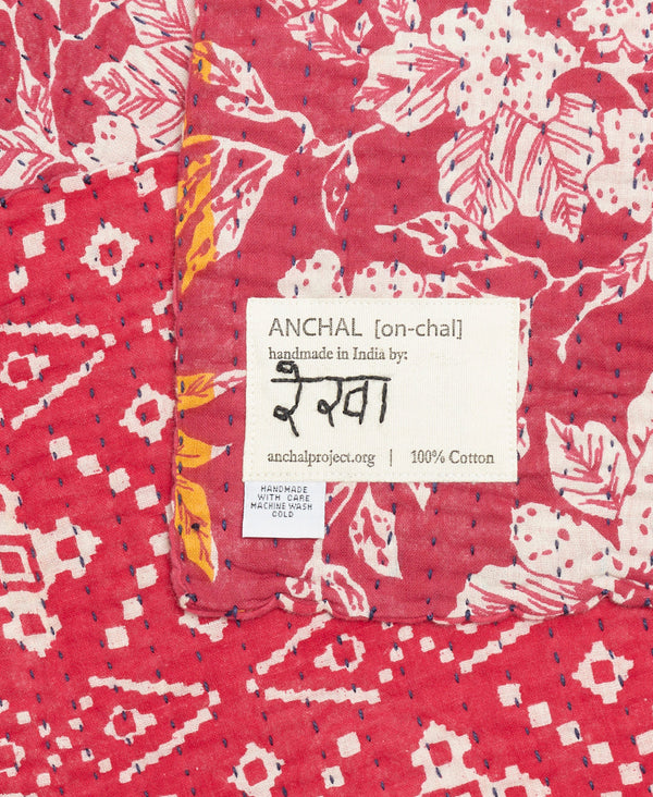 red hand-stitched kantha quilt made from upcycled saris