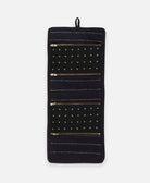 Black travel organizer with small white cross design