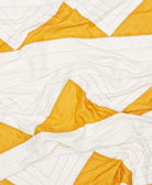 white and yellow geometric modern quilt throw by Anchal Project