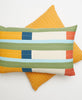 fair trade stamp lumbar and mustard cross-stitch pillows ethically and sustainably made in India
