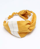 sustainable hair accessory featuring stripe twist headband made from organic cotton