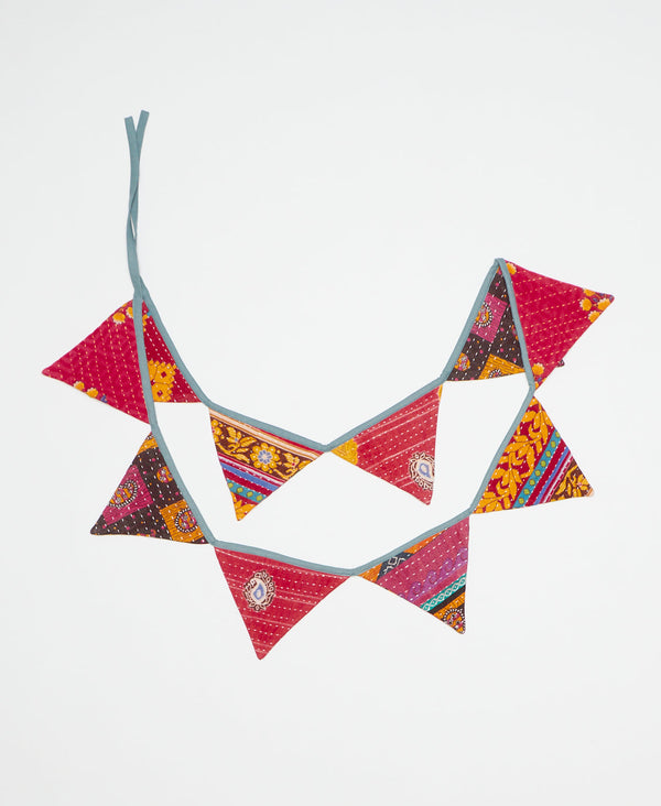 Ecofriendly reusable triangle garland created using upcycled vintage saris  
