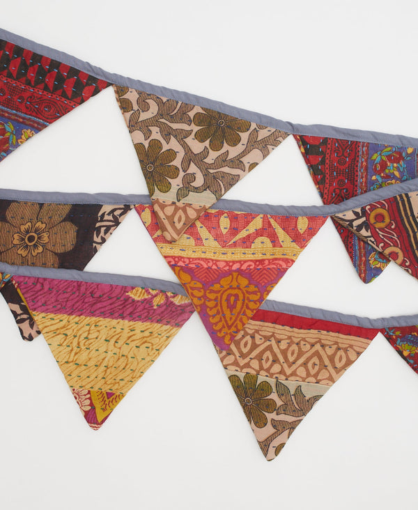 eco-friendly fair trade triangle party flag handmade by women artisans using scraps on recycled vintage cotton saris