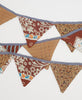 brown and blue one-of-a-kind garland handmade by women artisans using scraps of repurposed vintage cotton saris with traditional kantha stitching 