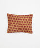 tan and red throw pillow sustainably handcrafted and handstitched by a woman artisan in Ajmer, India using white kantha stitching