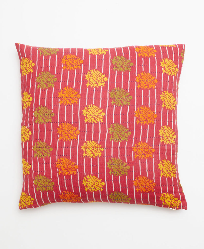Vintage kantha throw pillow featuring a white stripe pattern on a red base with a multicolored stamp print on top