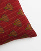 Artisan-made throw pillow created using upcycled vintage saris featuring yellow kantha stitching 