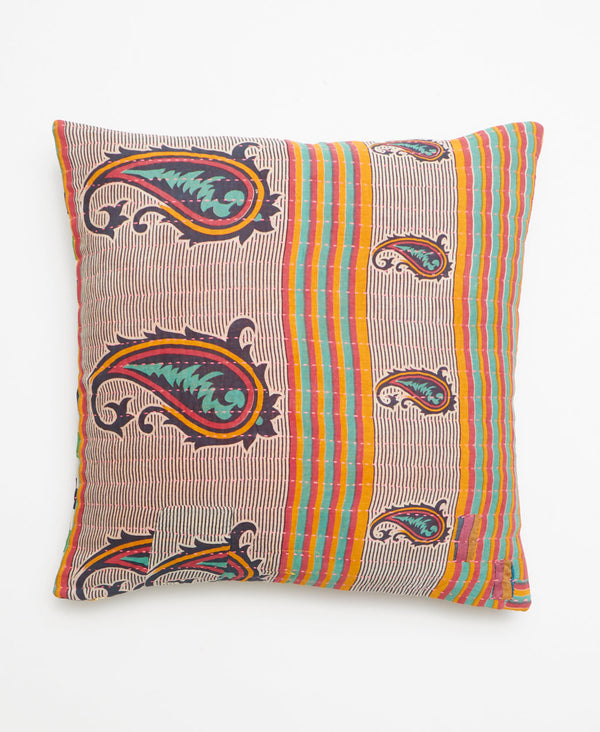 Opposite side of pillow featuring a contrasting stripe and paisley pattern 
