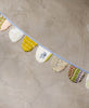 handmade scalloped upcycled fabric party fabric garland by Anchal Project