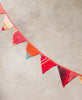 handmade fabric party garland in triangle shapes made from upcycled vintage cotton saris